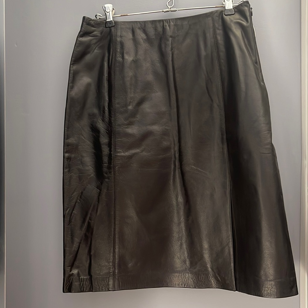 Ann Taylor black 100% leather skirt. Side spilt